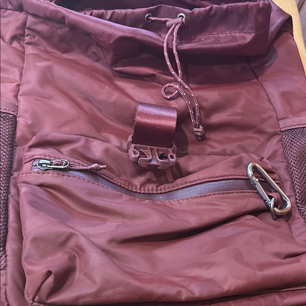 Stylish large Athleta Burgundy Backpack with zippers and padded back. - Picture 3 of 5